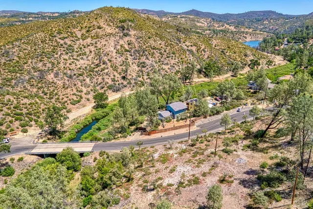 an aerial view of residential house with parking space