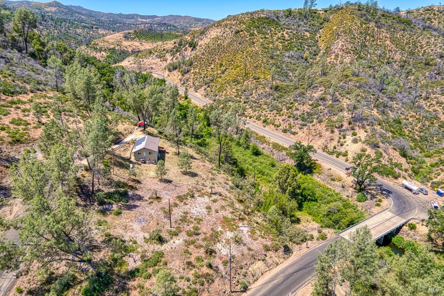 2163 Stagecoach Canyon Road Pope Valley, CA 94567 - Photo 7 of 22 an aerial view of residential house with parking space