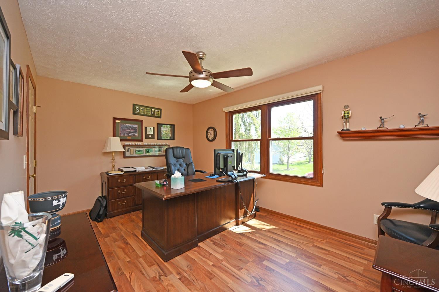 3444 Cutter Lane Maineville, OH 45039 - Photo 6 of 62 Front bedroom is currently used as a perfect looking office! Has a nice walk in closet if used as a bedroom!