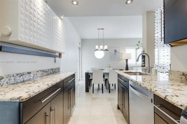 a kitchen with a stove and a sink