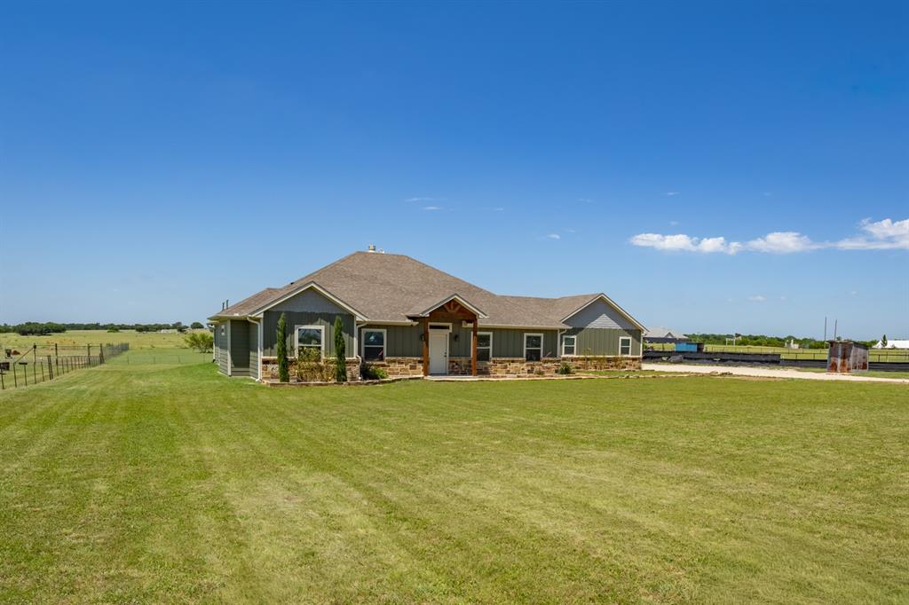 14910 Old Stoney Road Ponder, TX 76259 - Photo 2 of 36 a view of a house with a ocean view
