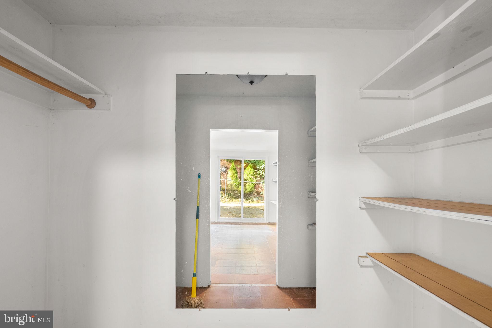 8702 Reading Road Silver Spring, MD 20901 - Photo 38 of 42 a front view of a house with a white door