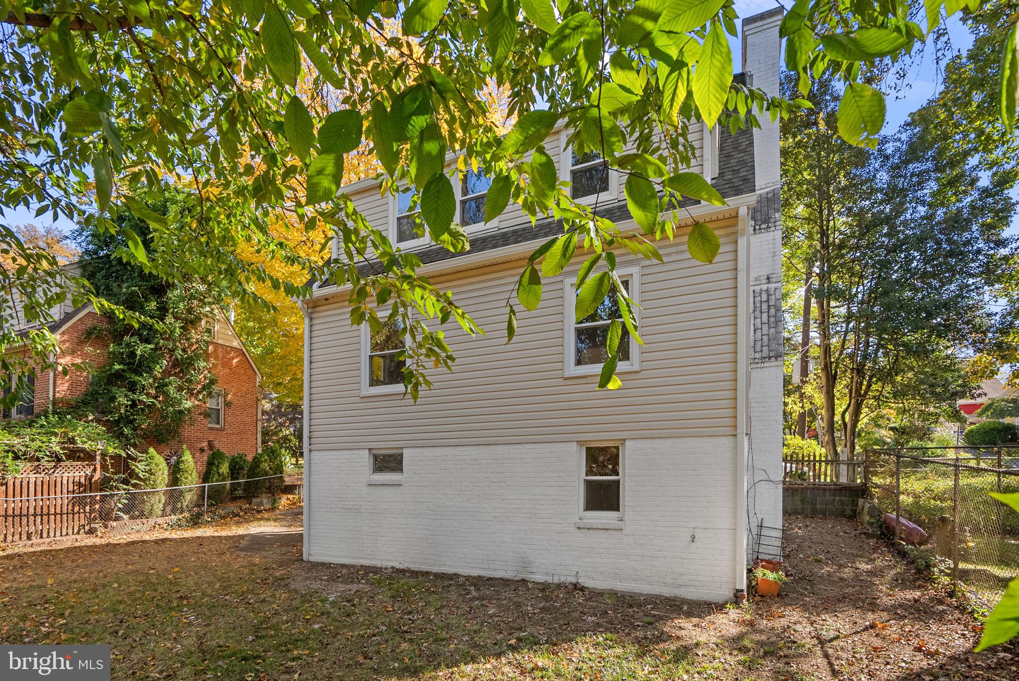 8702 Reading Road Silver Spring, MD 20901 - Photo 40 of 42 a view of a house with a tree