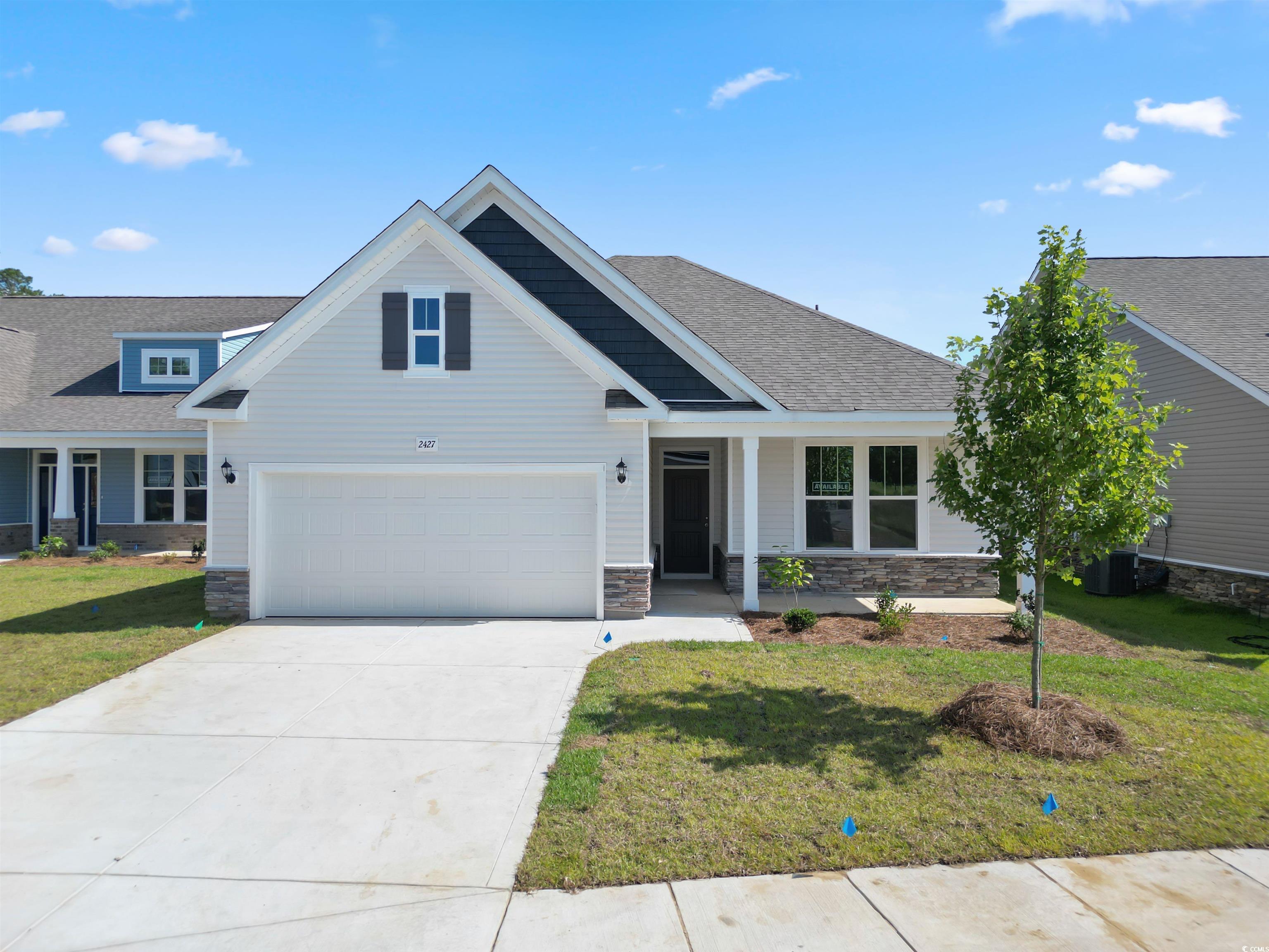 2427 Campton Loop Conway, SC 29527 - Photo 1 of 40 Craftsman-style house with a front yard and centra