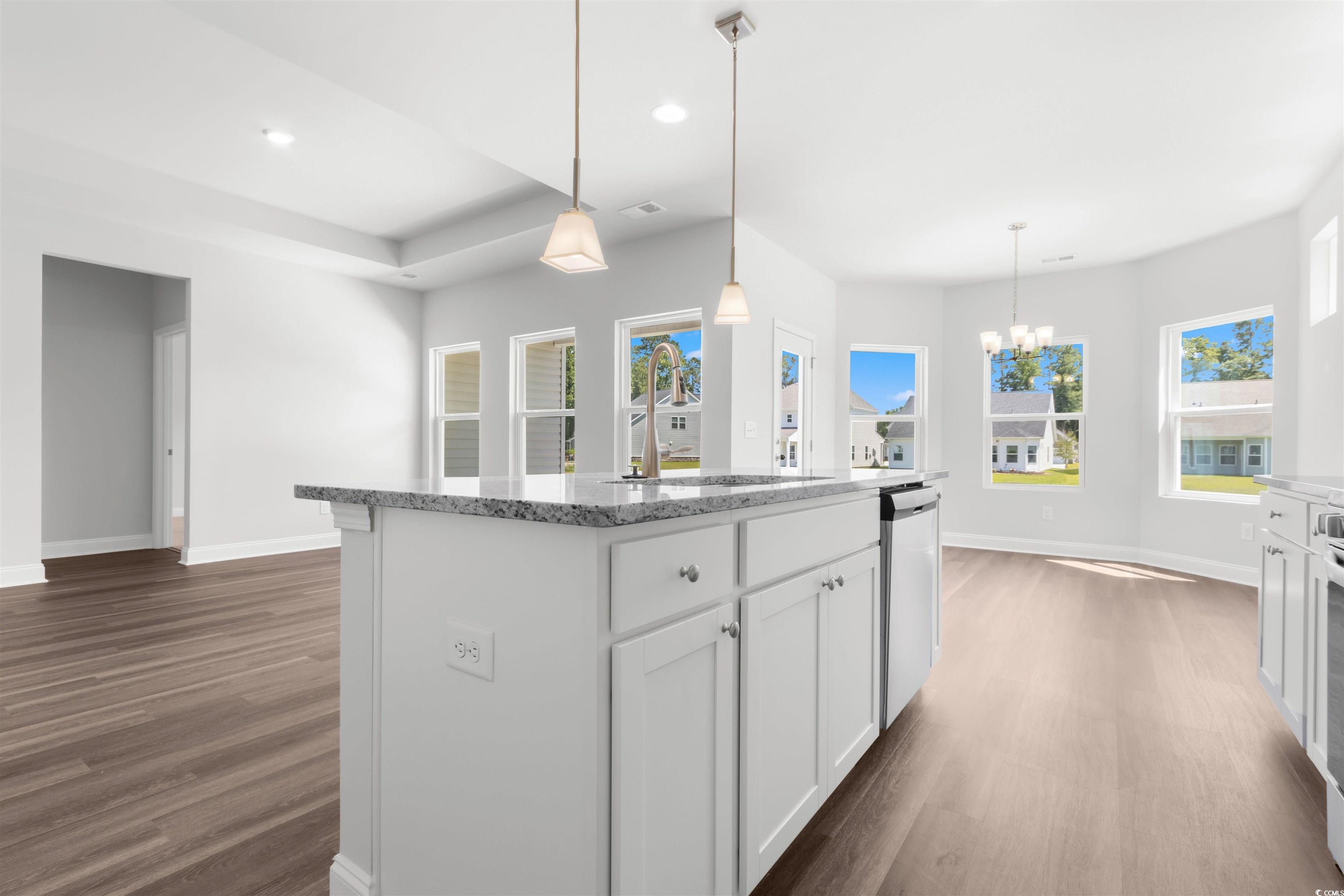 2427 Campton Loop Conway, SC 29527 - Photo 15 of 40 Kitchen with decorative light fixtures, an island