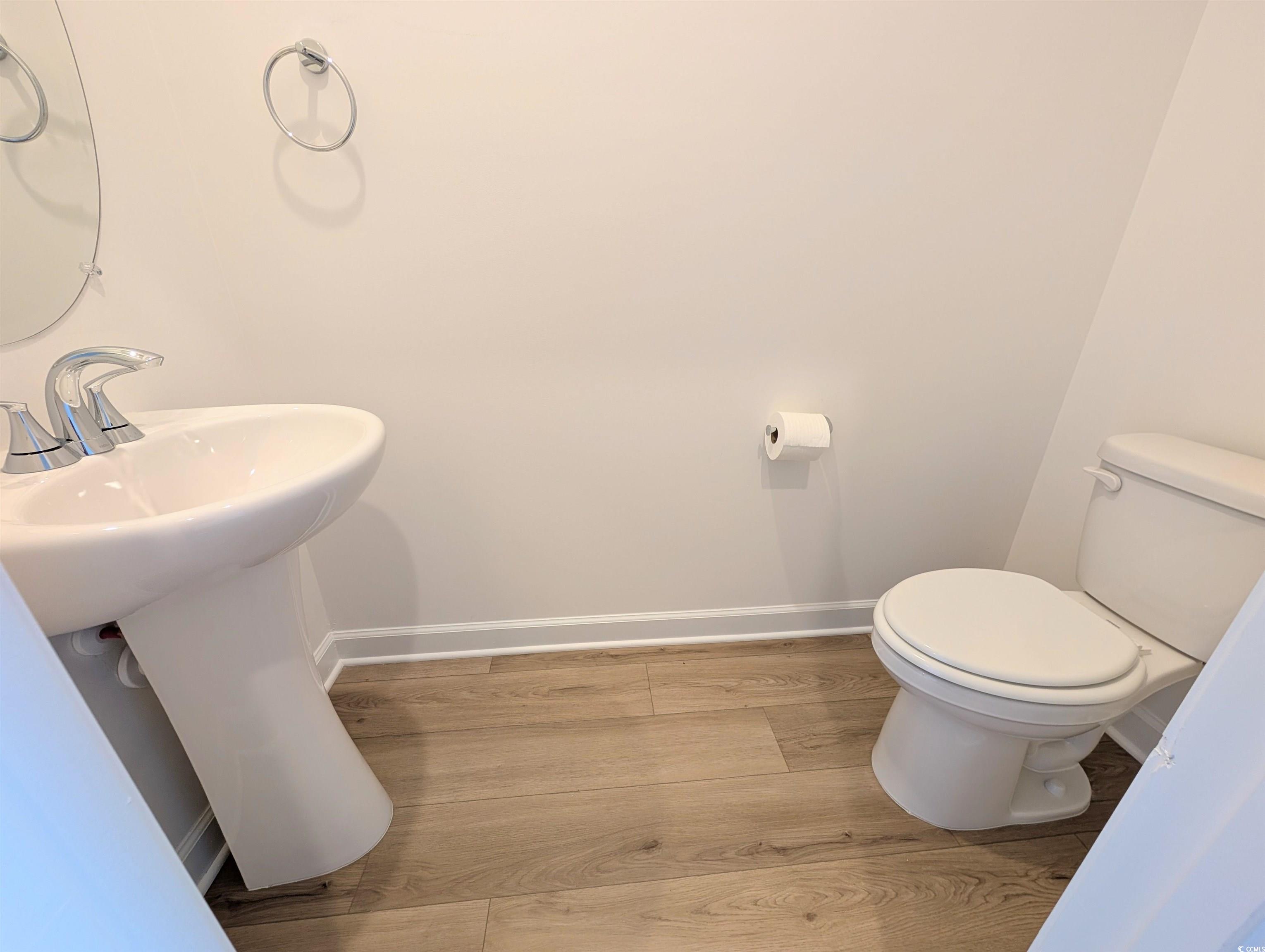 1109 Lauryn Oak Loop Longs, SC 29568 - Photo 14 of 40 Bathroom with baseboards and light wood finished floors