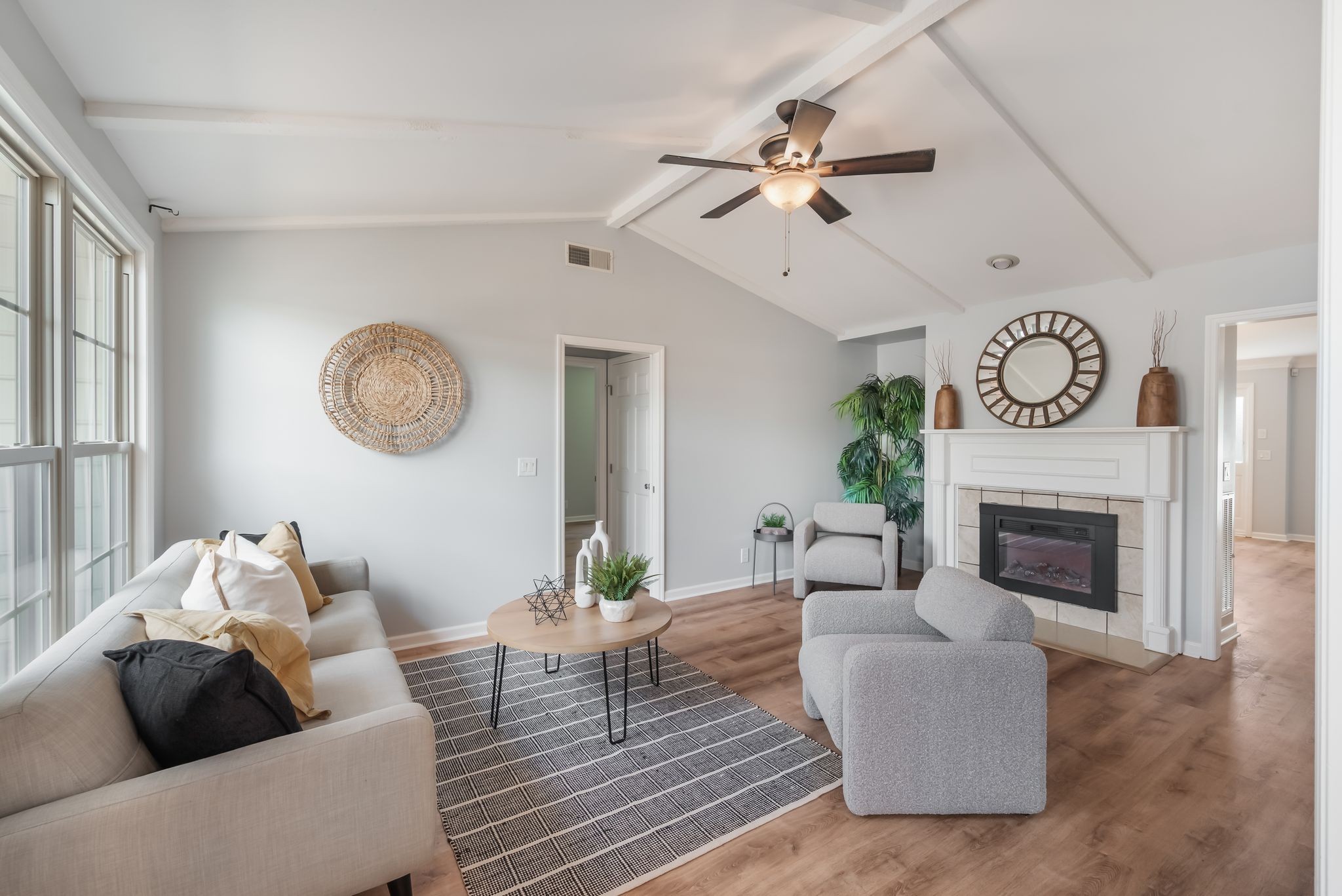1281 General George Patton Road Nashville, TN 37221 - Photo 12 of 32 a living room with furniture and a fireplace