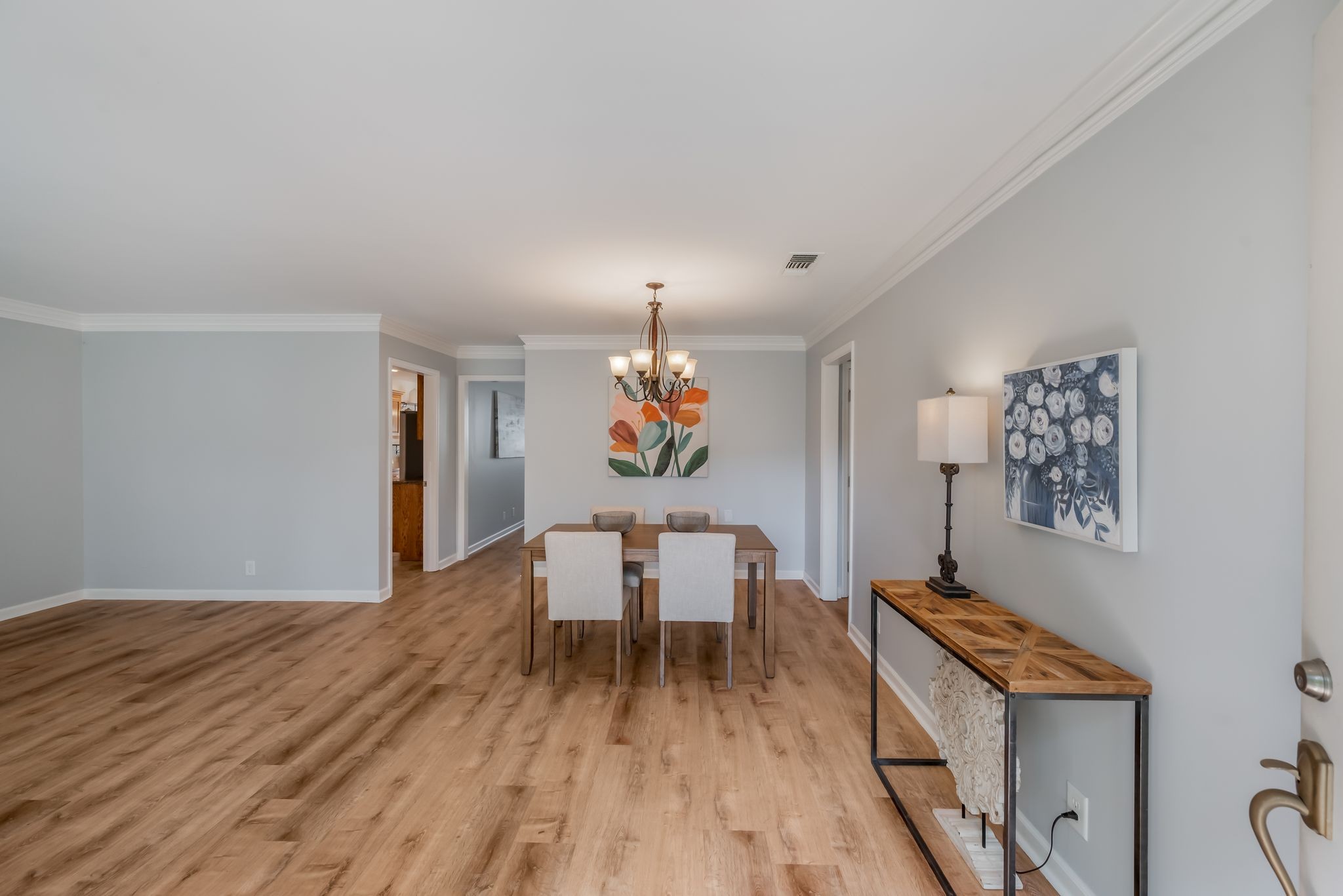 1281 General George Patton Road Nashville, TN 37221 - Photo 15 of 32 a living room with dining room and wooden floor