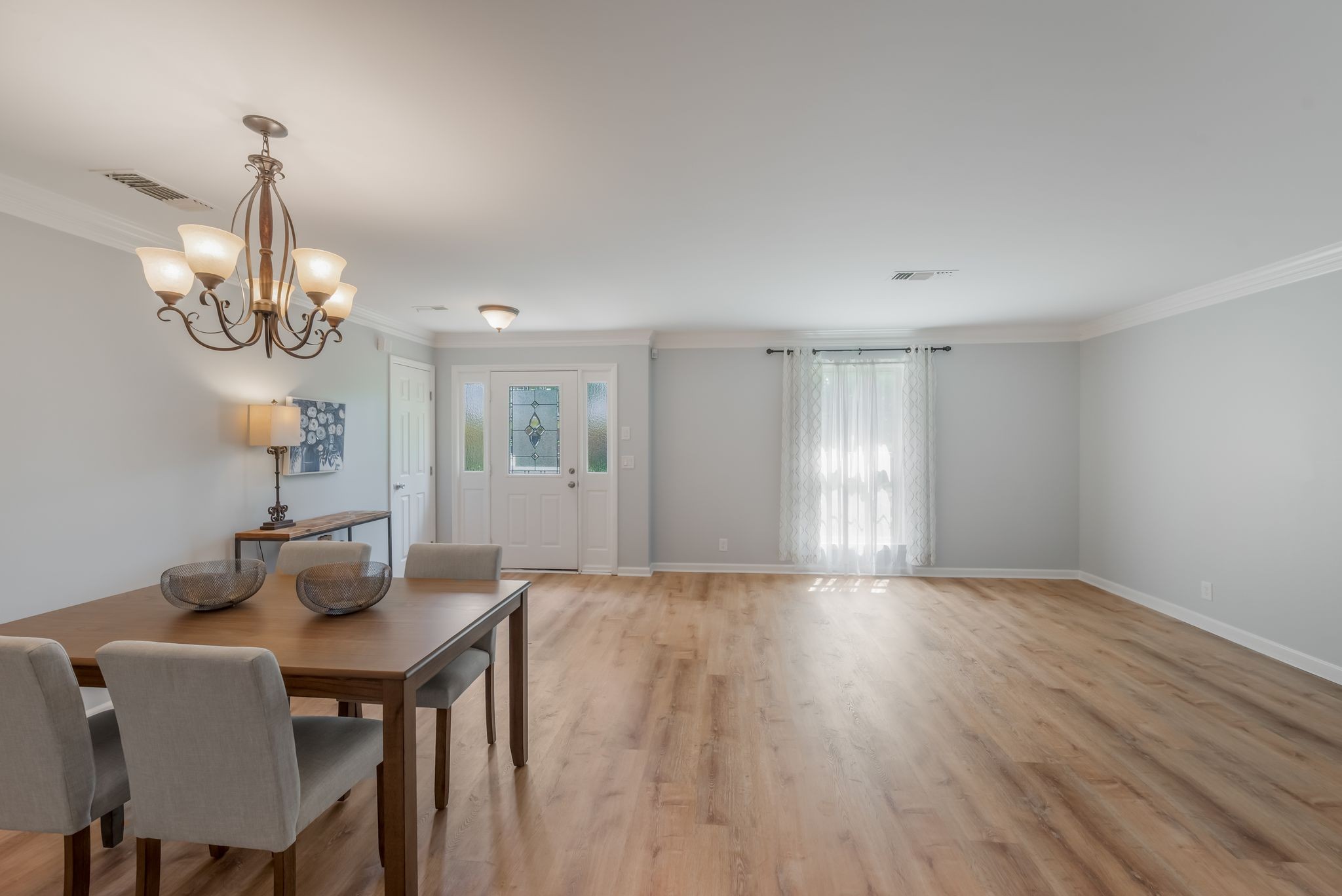 1281 General George Patton Road Nashville, TN 37221 - Photo 17 of 32 a view of a dining room with furniture wooden floor and chandelier