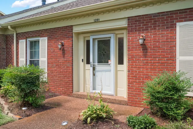 a front view of a house with an outdoor space