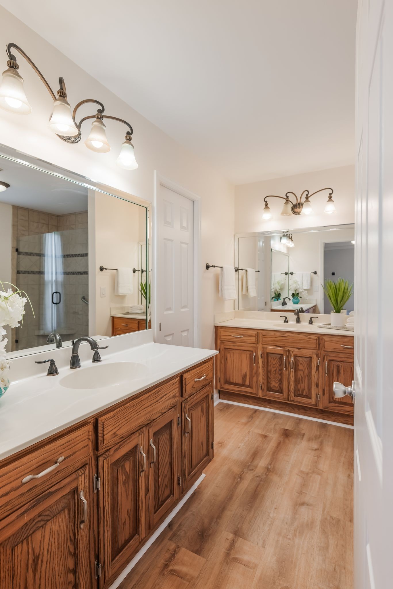 1281 General George Patton Road Nashville, TN 37221 - Photo 21 of 32 a bathroom with a sink double vanity and a mirror