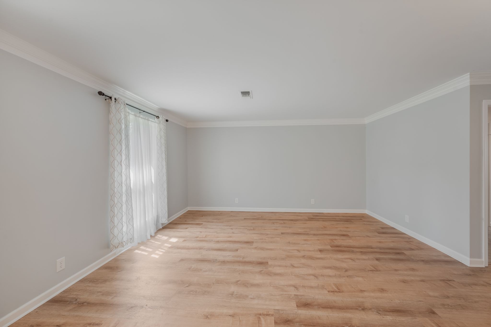 1281 General George Patton Road Nashville, TN 37221 - Photo 23 of 32 a view of an empty room with wooden floor