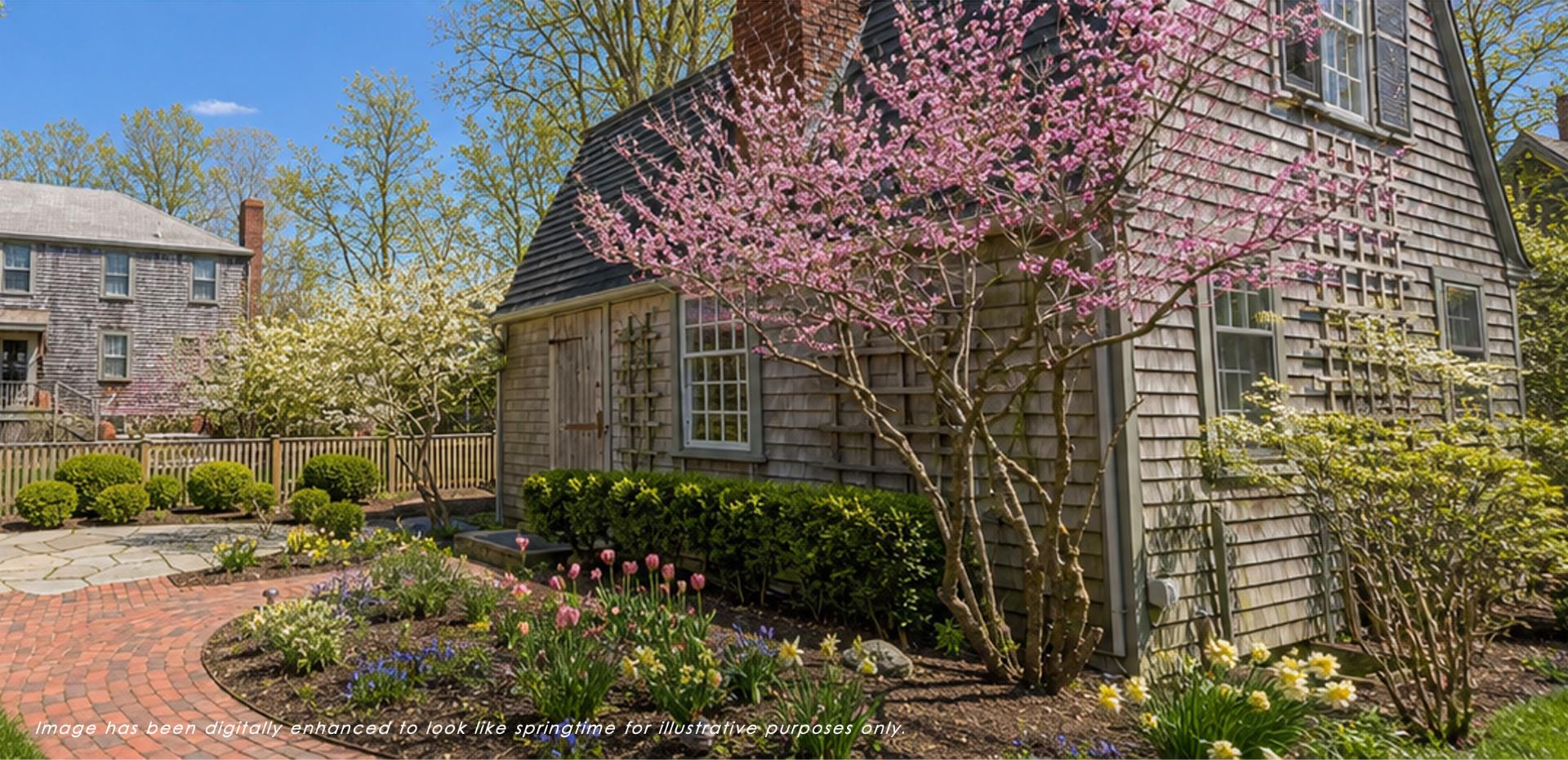 24 Milk Street Nantucket, MA 02554 - Photo 3 of 39 a house with a tree in front of it