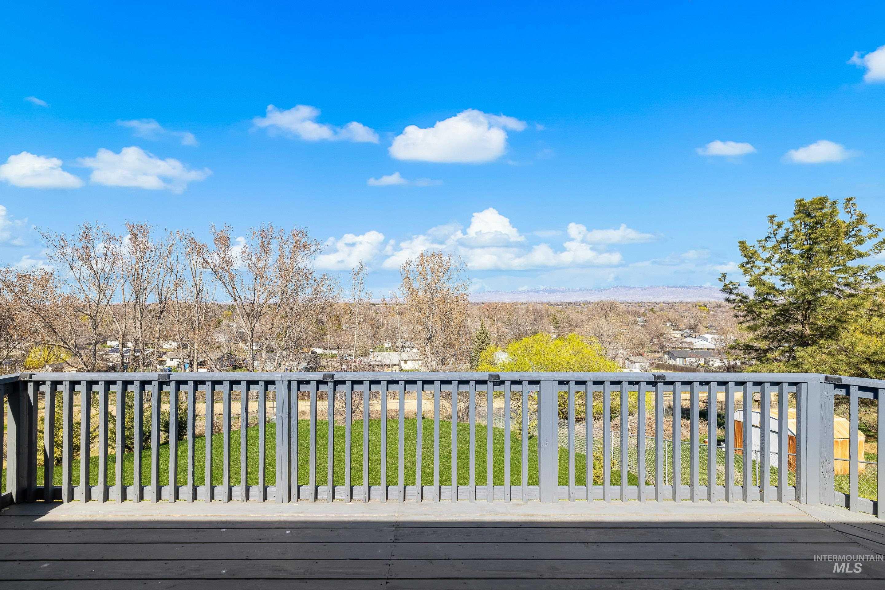 10294 West Fox Ridge Drive Boise, ID 83709 - Photo 42 of 50 Wooden deck with a lawn