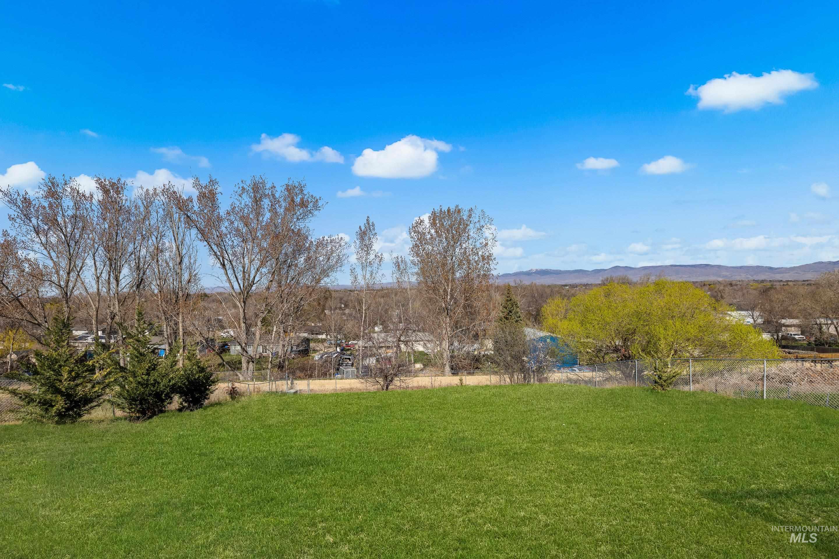 10294 West Fox Ridge Drive Boise, ID 83709 - Photo 48 of 50 View of yard with a mountain view