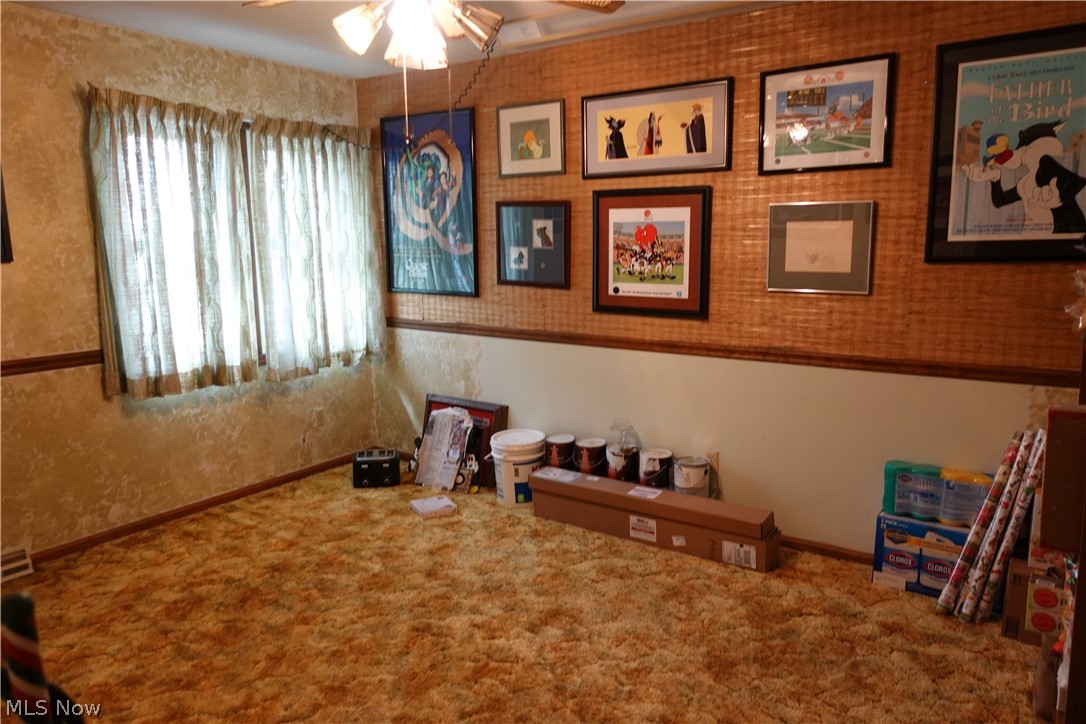 15488 Hatfield Road Rittman, OH 44270 - Photo 21 of 36 Game room featuring a healthy amount of sunlight, ceiling fan, and carpet flooring