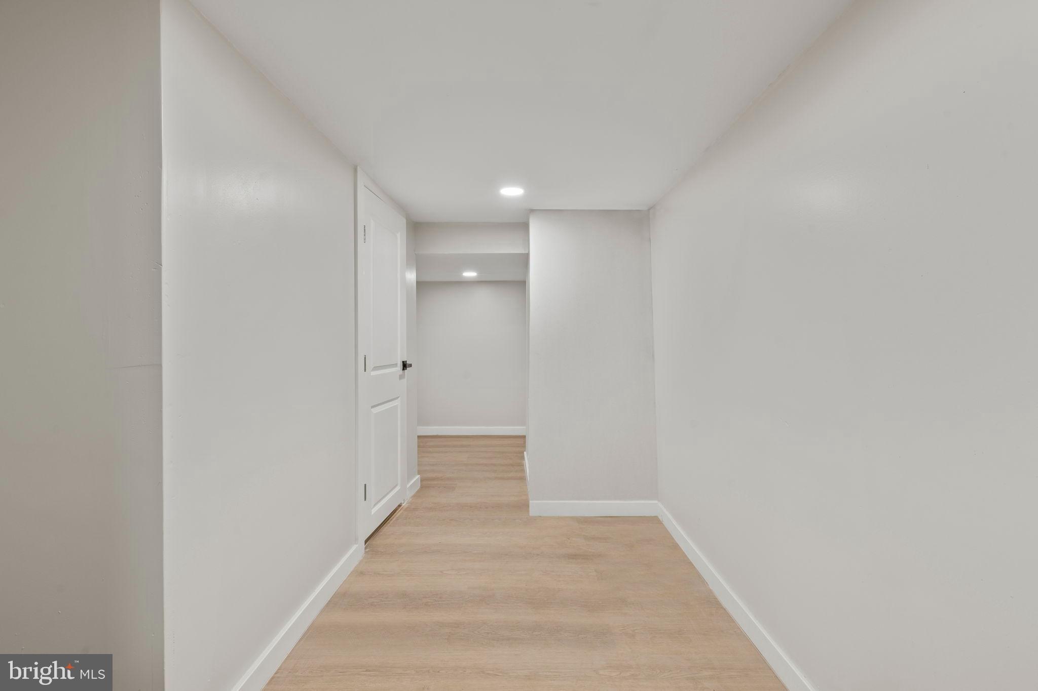 2321 West Firth Street Philadelphia, PA 19132 - Photo 16 of 21 Bright and spacious hallway invites exploration.