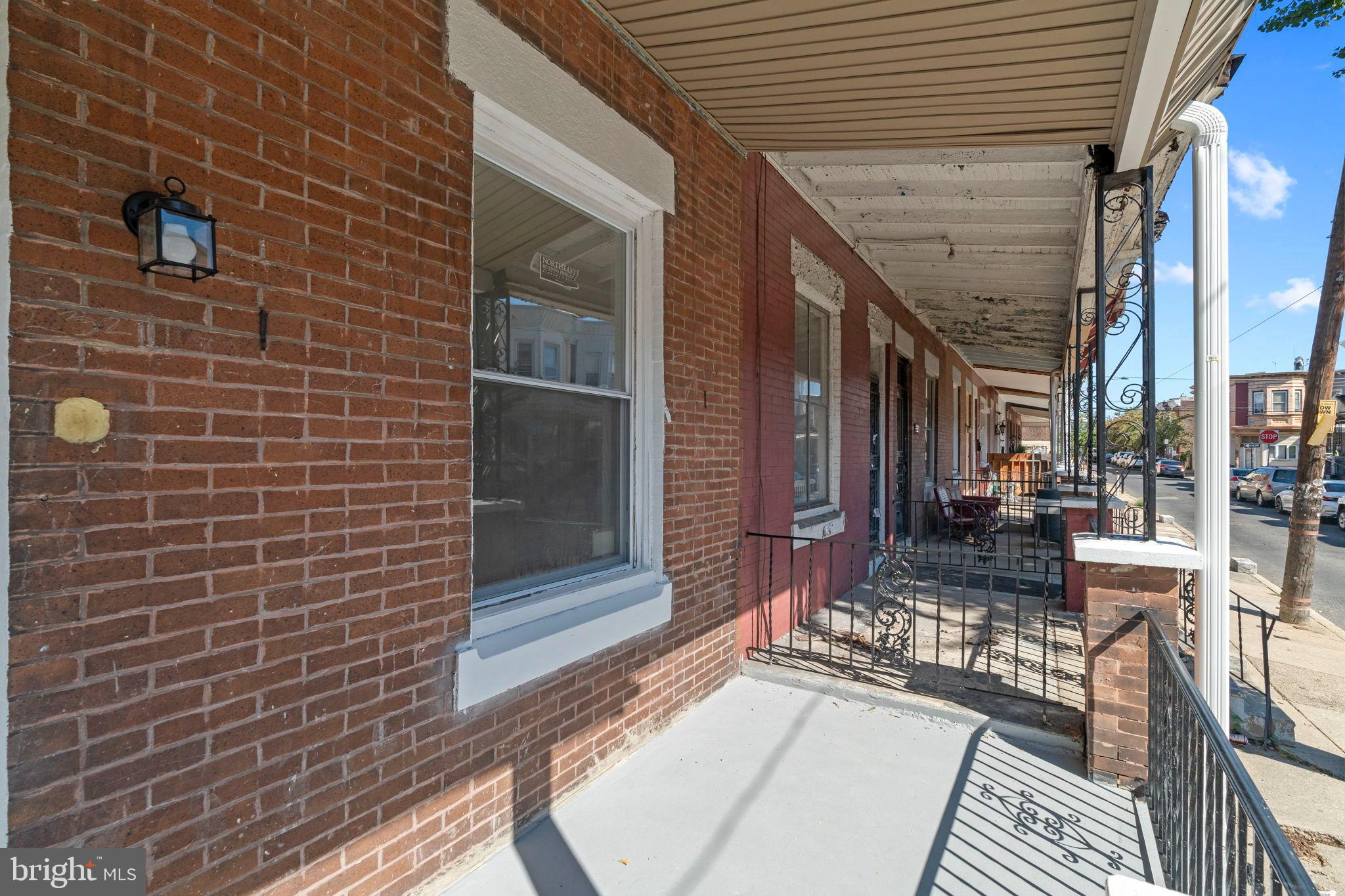 2321 West Firth Street Philadelphia, PA 19132 - Photo 2 of 21 Charming brick facade with inviting porch.