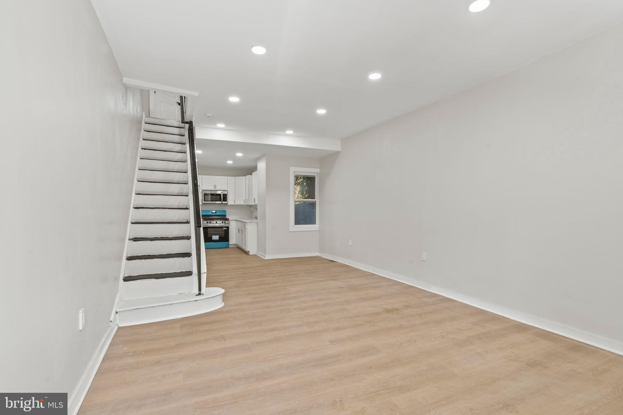2321 West Firth Street Philadelphia, PA 19132 - Photo 3 of 21 Spacious, modern living area with natural light.