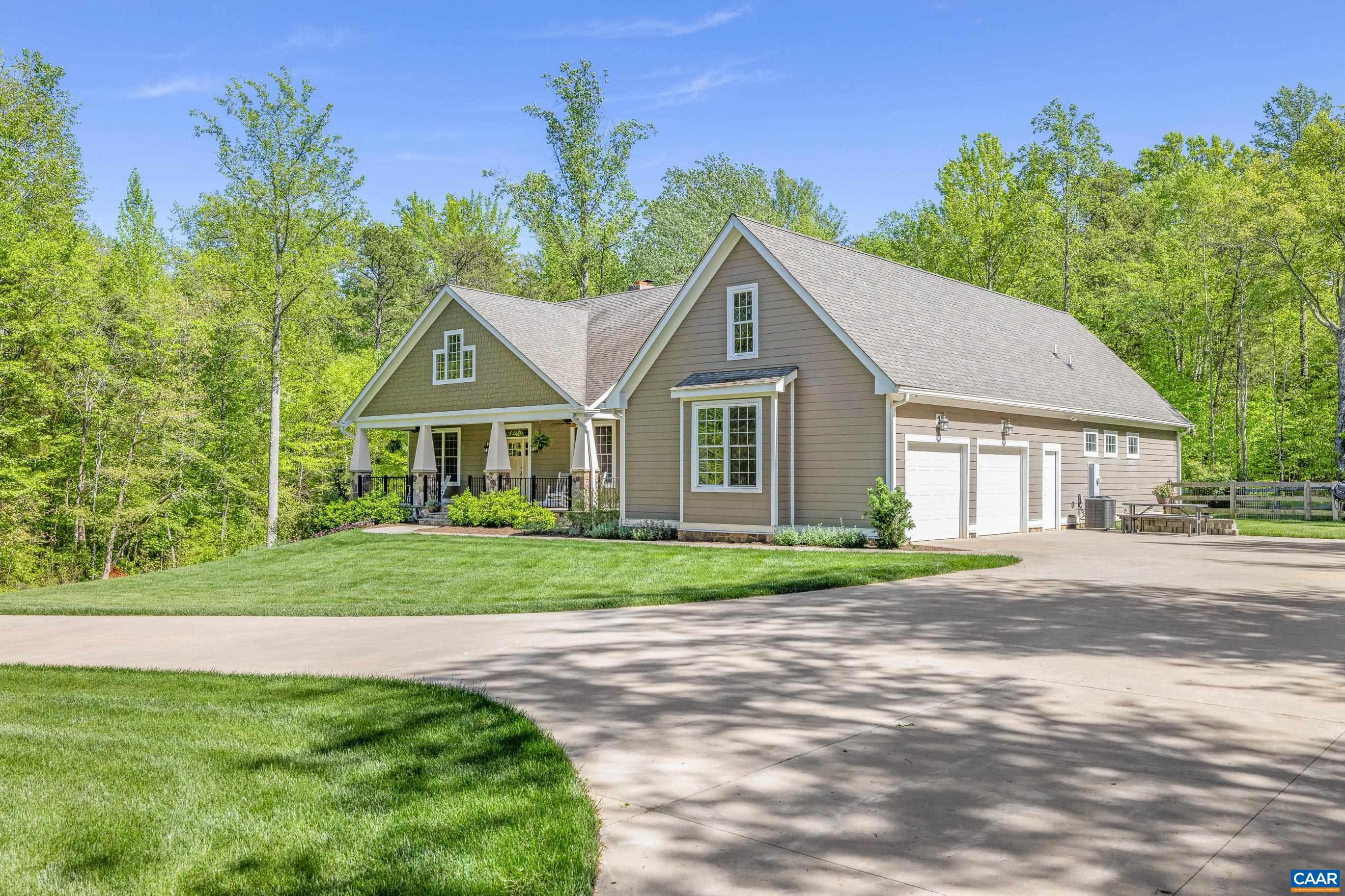 7325 3 Notch Road Louisa, VA 23093 - Photo 2 of 65 a front view of a house with a yard
