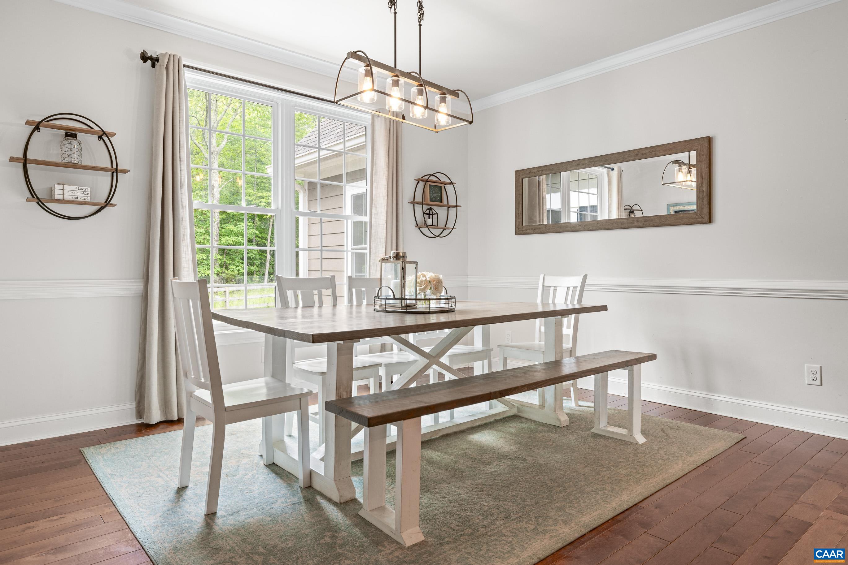7325 3 Notch Road Louisa, VA 23093 - Photo 25 of 65 a view of a dining room with furniture window and wooden floor