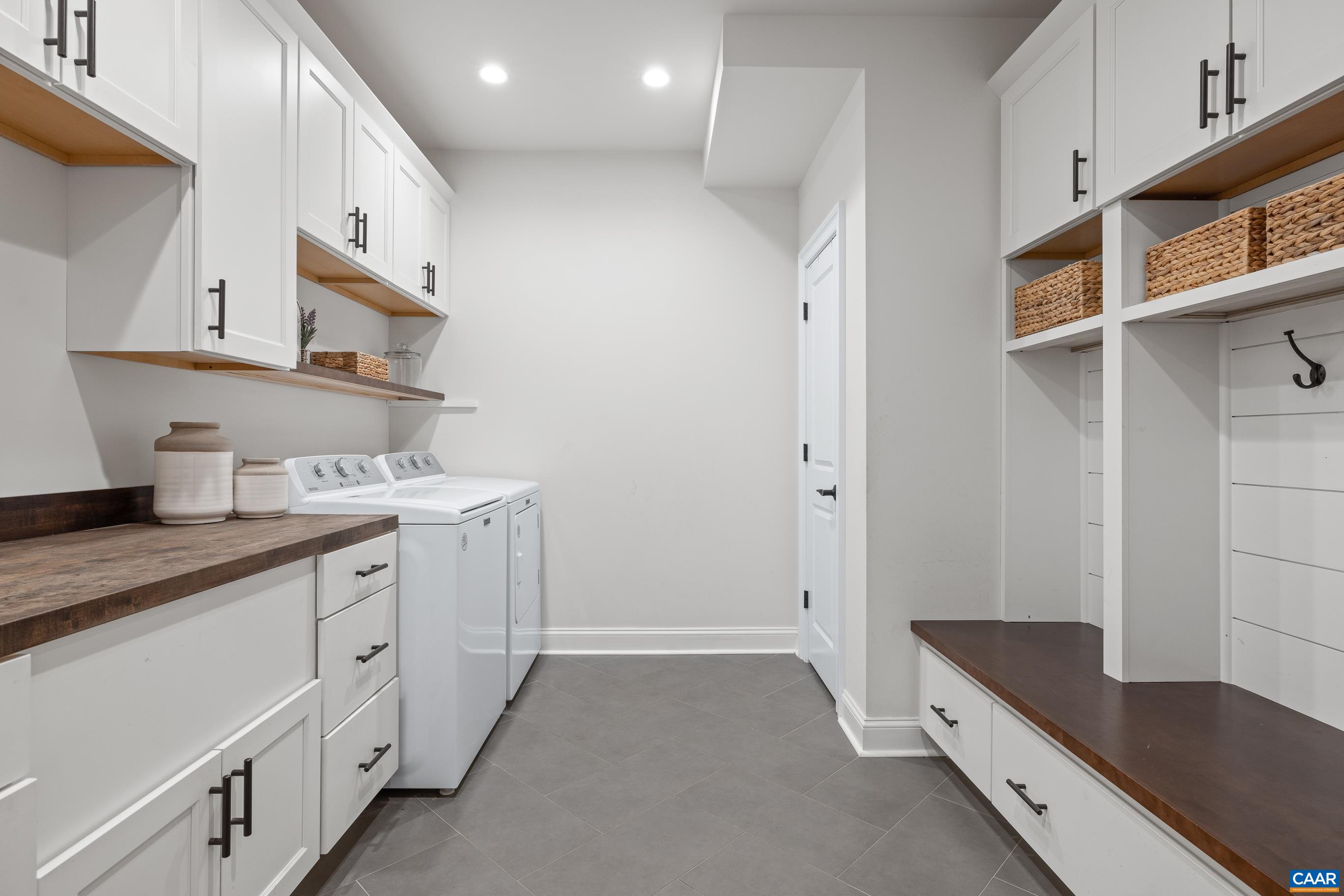 7325 3 Notch Road Louisa, VA 23093 - Photo 27 of 65 a kitchen with granite countertop a sink and cabinets