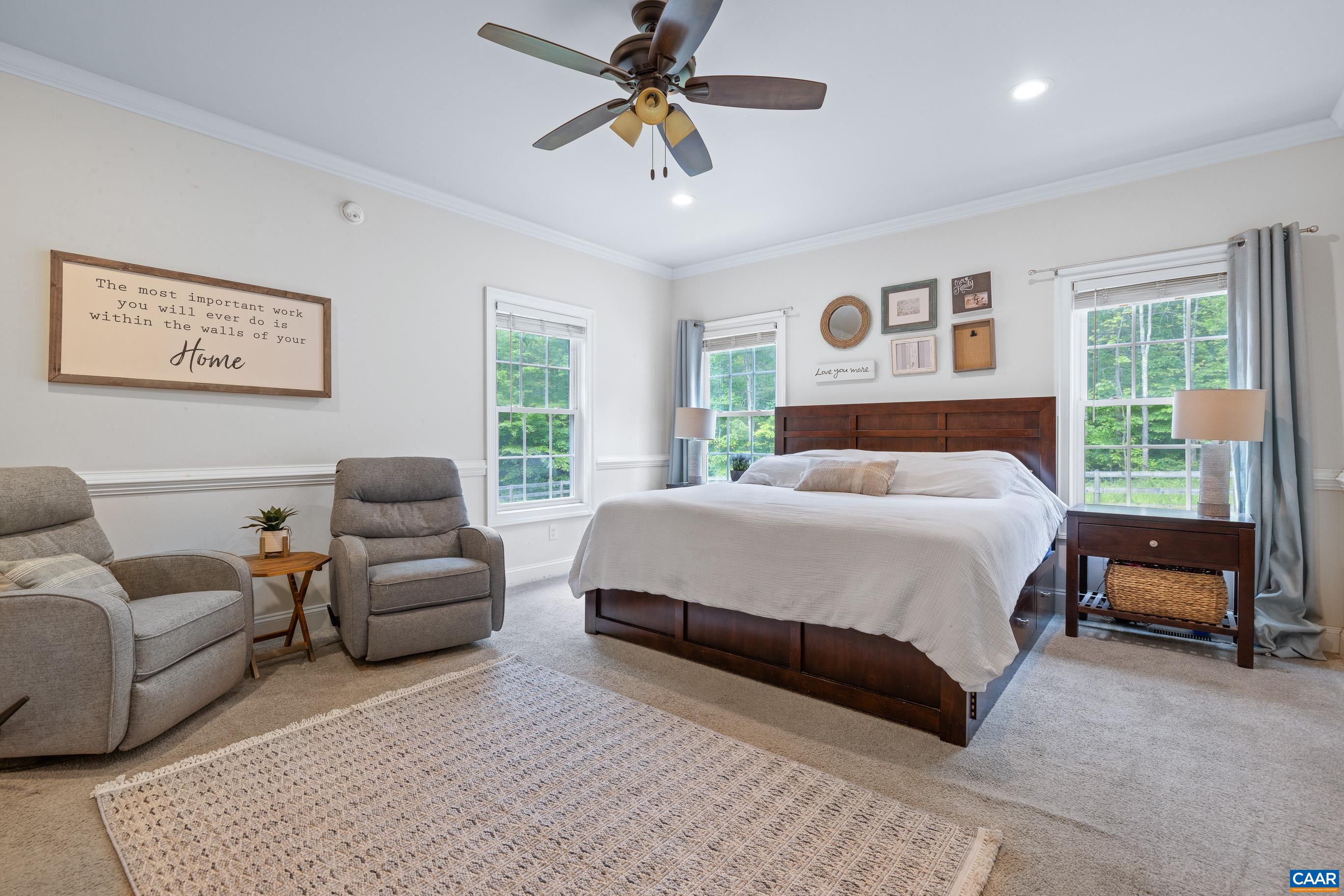 7325 3 Notch Road Louisa, VA 23093 - Photo 30 of 65 a bedroom with a bed couch and a window