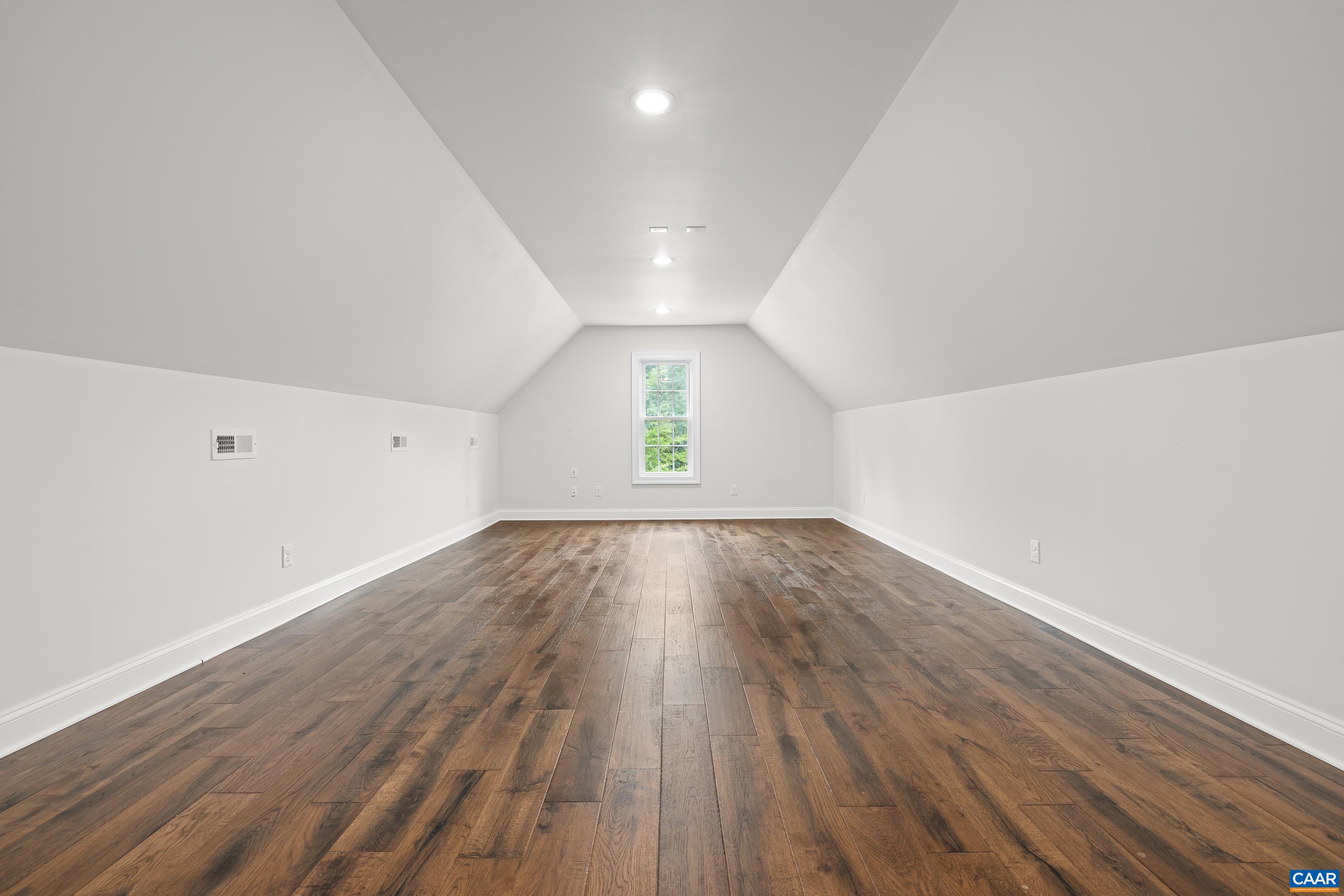 7325 3 Notch Road Louisa, VA 23093 - Photo 43 of 65 an empty room with wooden floor and windows