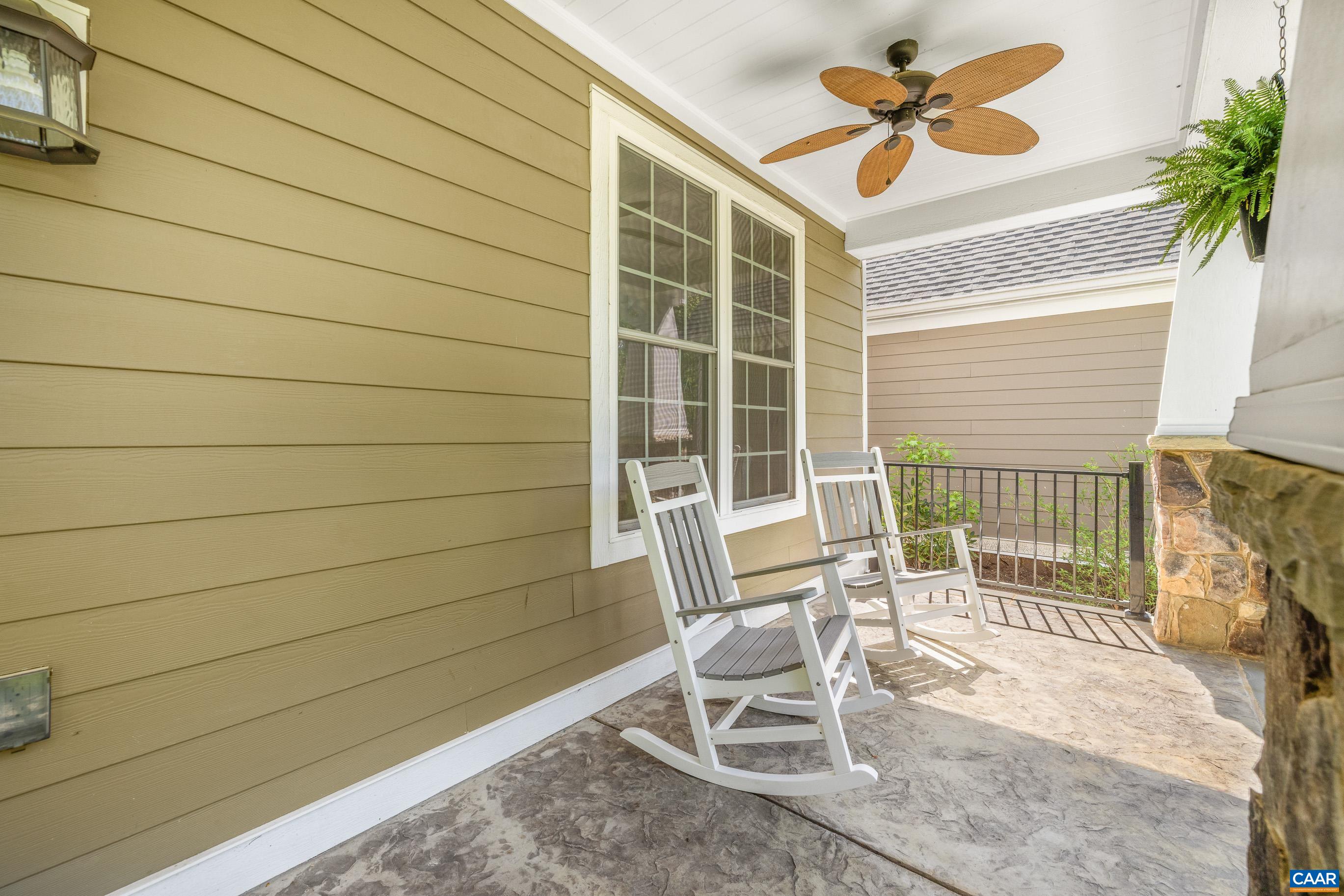 7325 3 Notch Road Louisa, VA 23093 - Photo 6 of 65 a view of a chair and table in the back yard of a house