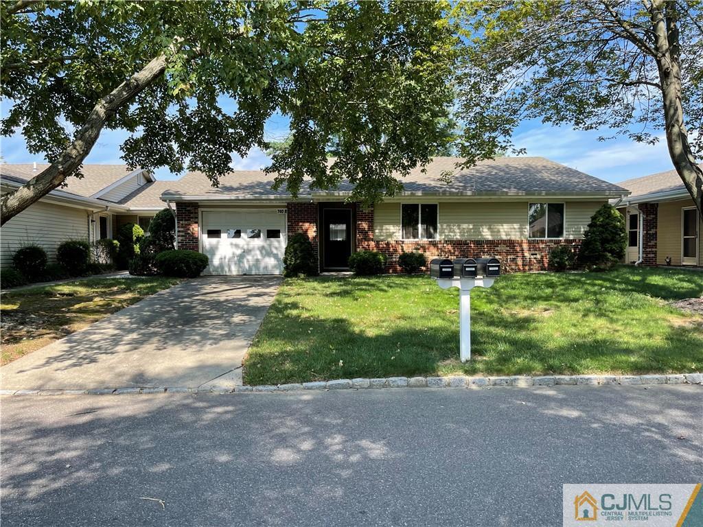 740 Pompton Road, Unit B Monroe Township, NJ 08831 - Photo 1 of 1 a front view of a house with a yard
