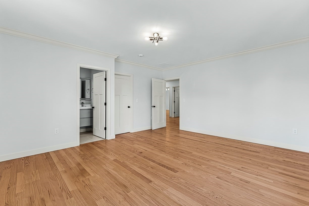443 Central Avenue Needham, MA 02494 - Photo 32 of 41 a view of an empty room and wooden floor