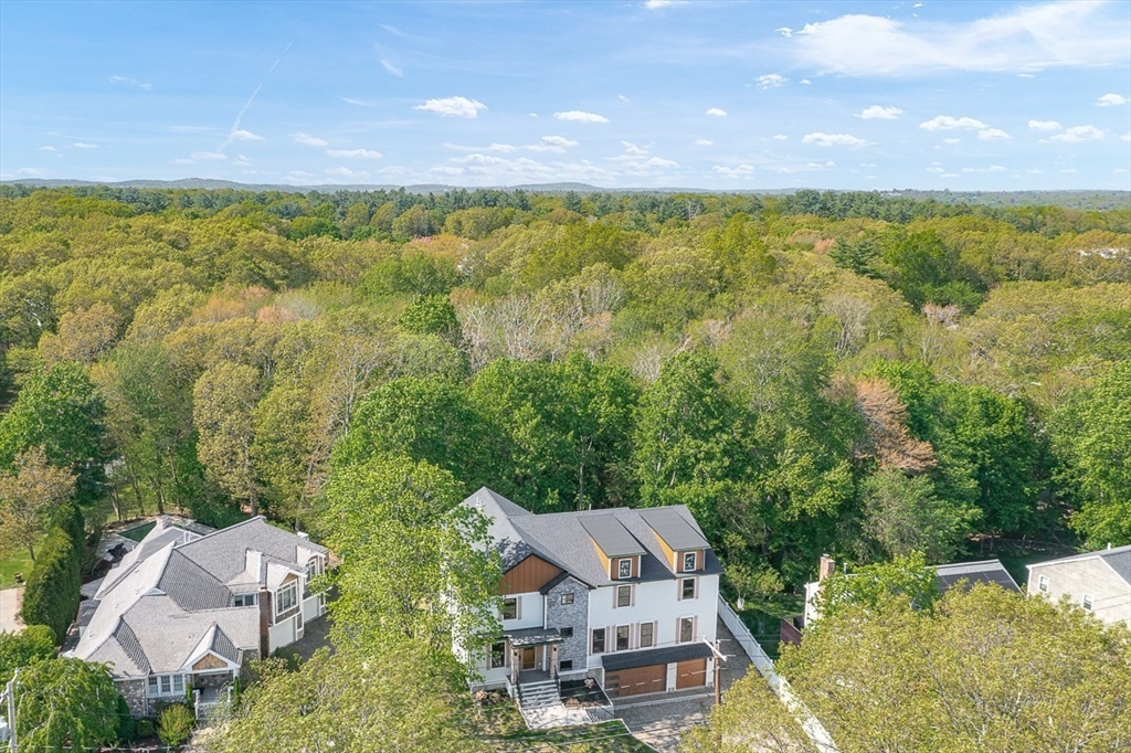 443 Central Avenue Needham, MA 02494 - Photo 39 of 41 an aerial view of residential house with outdoor space and trees all around