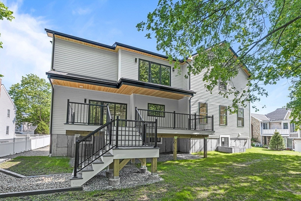 443 Central Avenue Needham, MA 02494 - Photo 40 of 41 front view of a house with a yard
