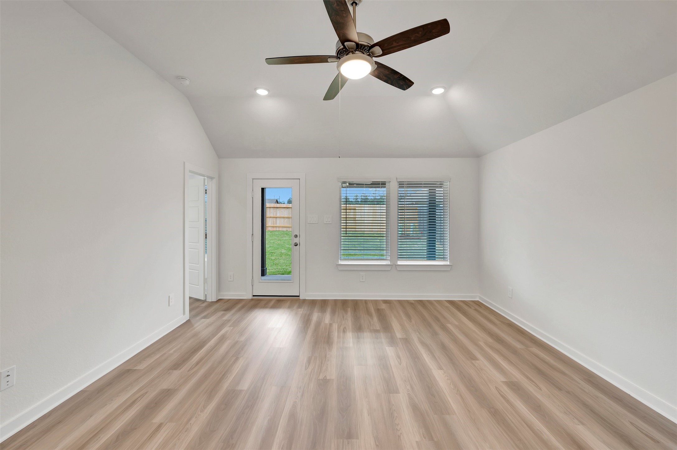 543 Flower Reed Court Magnolia, TX 77354 - Photo 22 of 46 wooden floor in an empty room with a window