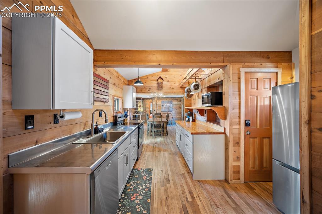 11855 Grandin Point Elbert, CO 80106 - Photo 13 of 42 a very nice looking living room with a large window and wooden floor