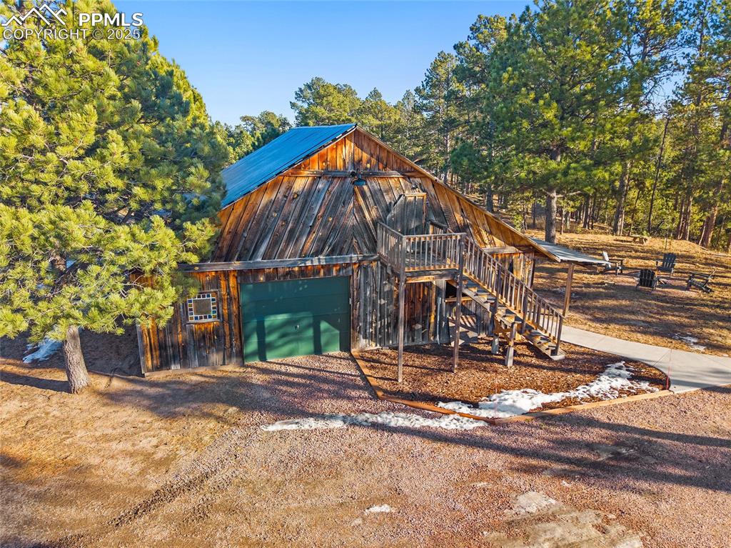 11855 Grandin Point Elbert, CO 80106 - Photo 2 of 42 a view of a house with backyard and trees