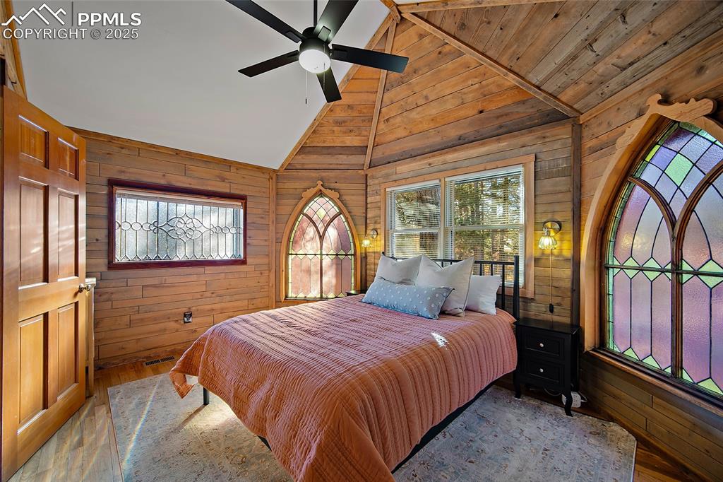 11855 Grandin Point Elbert, CO 80106 - Photo 21 of 42 a bedroom with a large bed and a window