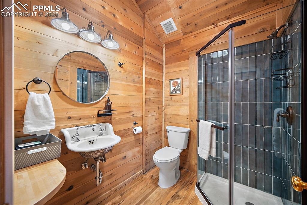 11855 Grandin Point Elbert, CO 80106 - Photo 8 of 42 a bathroom with a sink toilet and shower