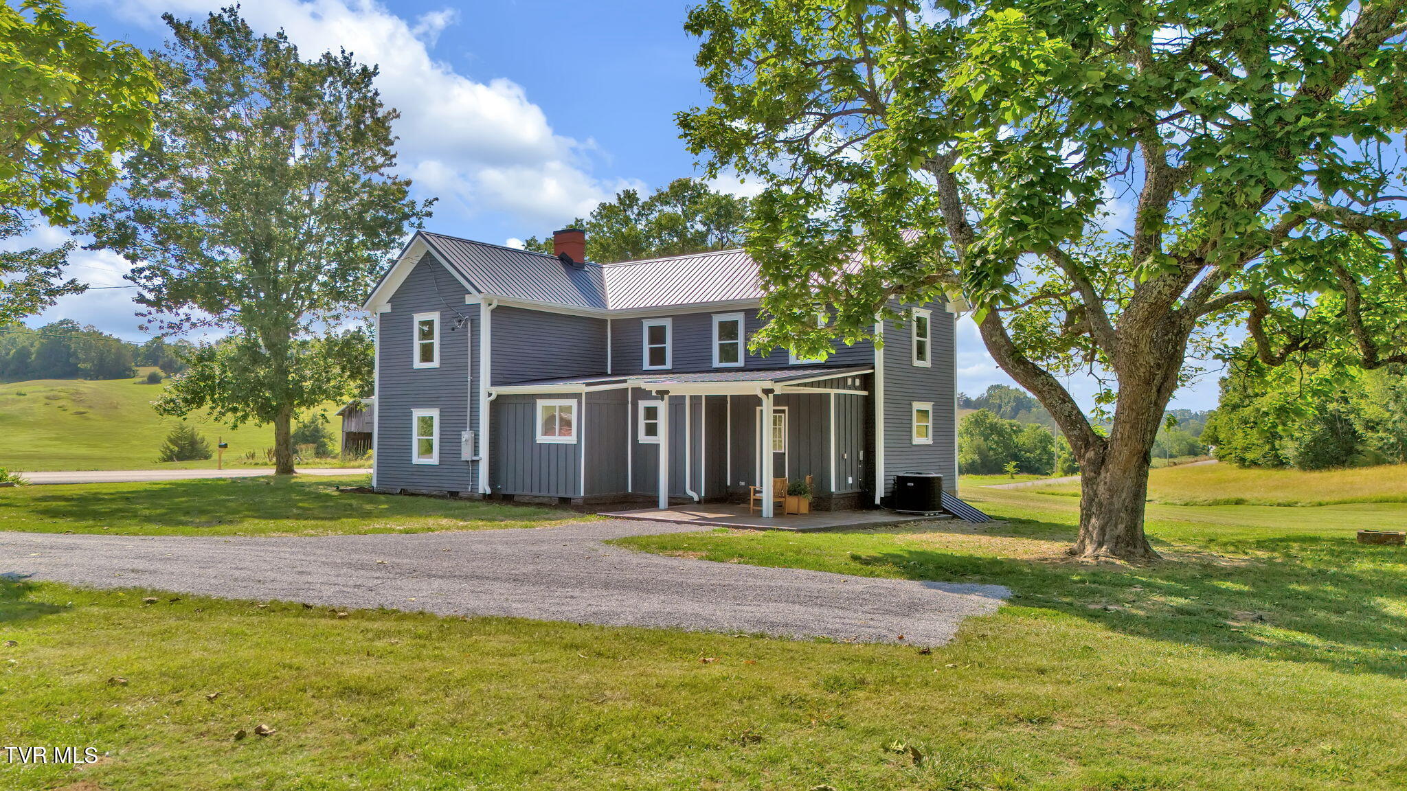 700 Burkey Road Greeneville, TN 37743 - Photo 2 of 45 48-web-or-mls-DJI_20240704165942_0031_D