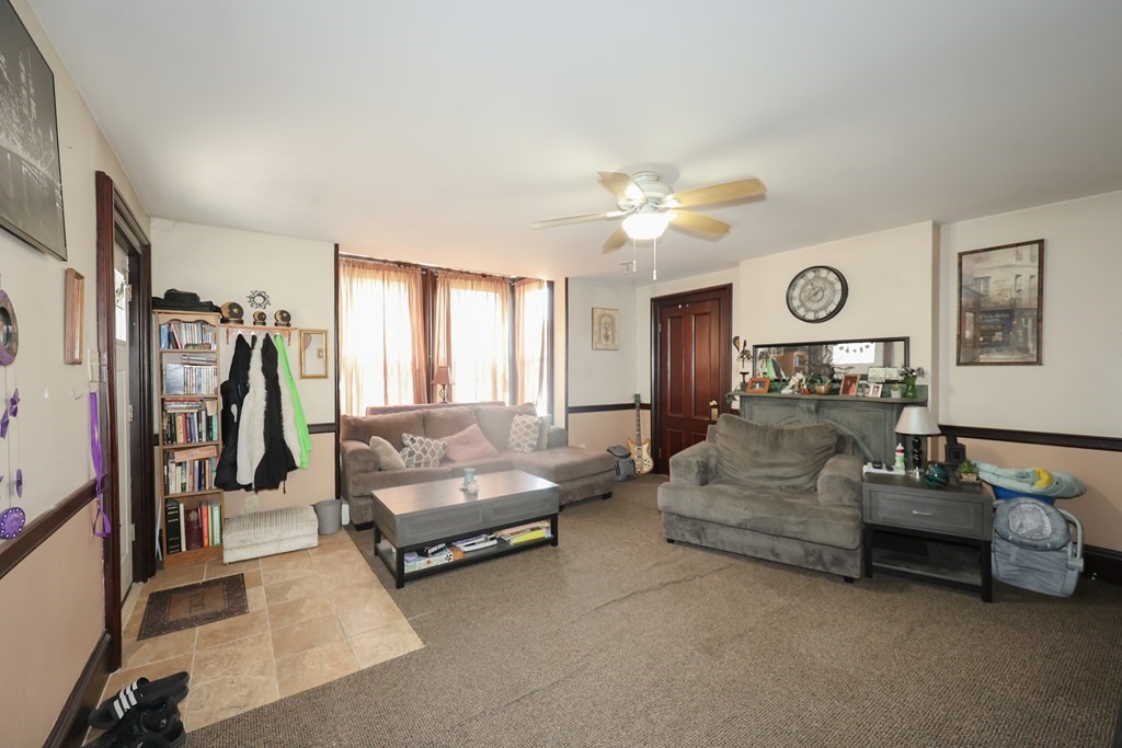 1450 Main Street Athol, MA 01331 - Photo 13 of 42 a living room with furniture and a large window