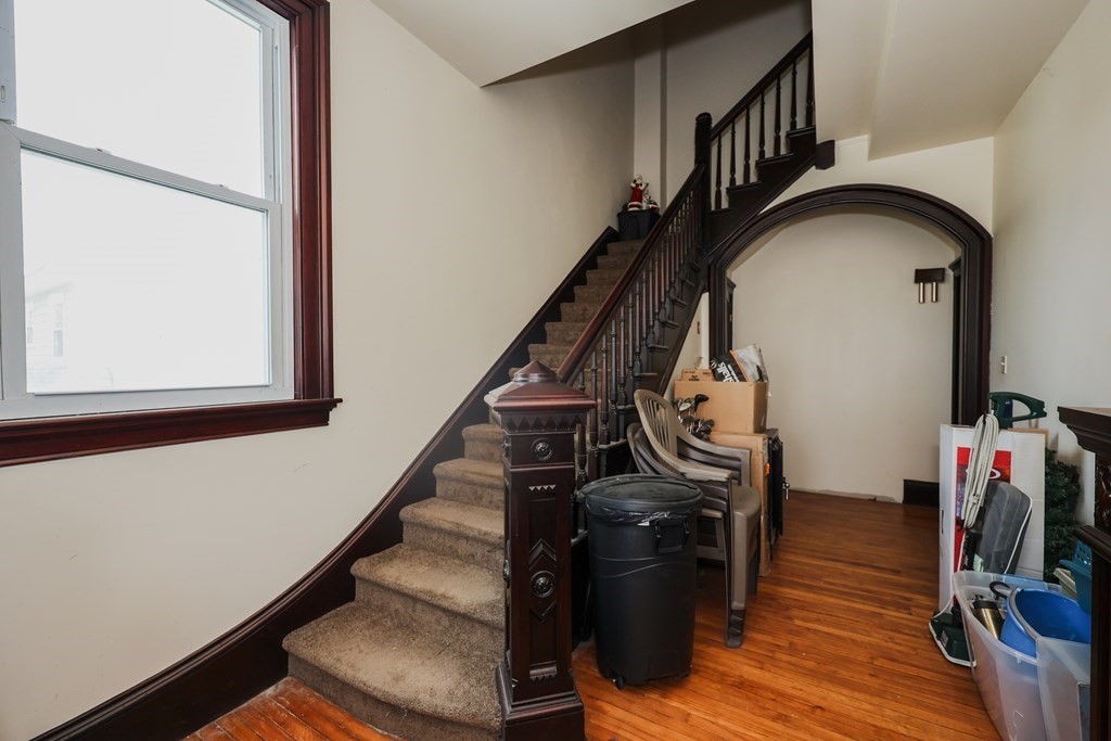 1450 Main Street Athol, MA 01331 - Photo 22 of 42 a view of staircase with wooden floor and a window