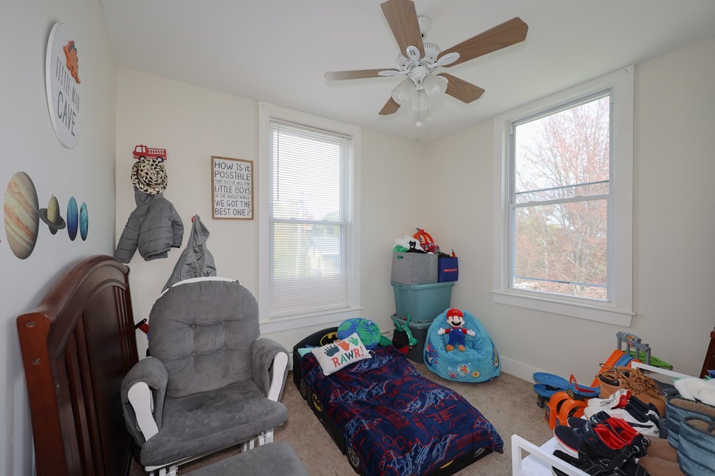 1450 Main Street Athol, MA 01331 - Photo 31 of 42 a living room with furniture chess board and a window