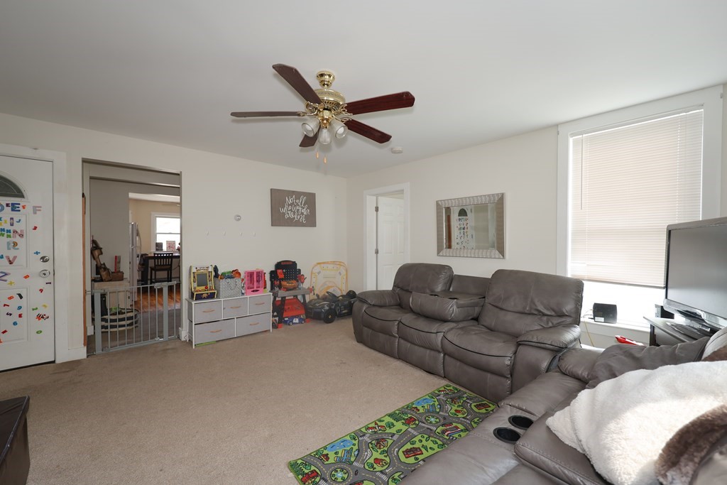 1450 Main Street Athol, MA 01331 - Photo 33 of 42 a living room with furniture and a wooden floor
