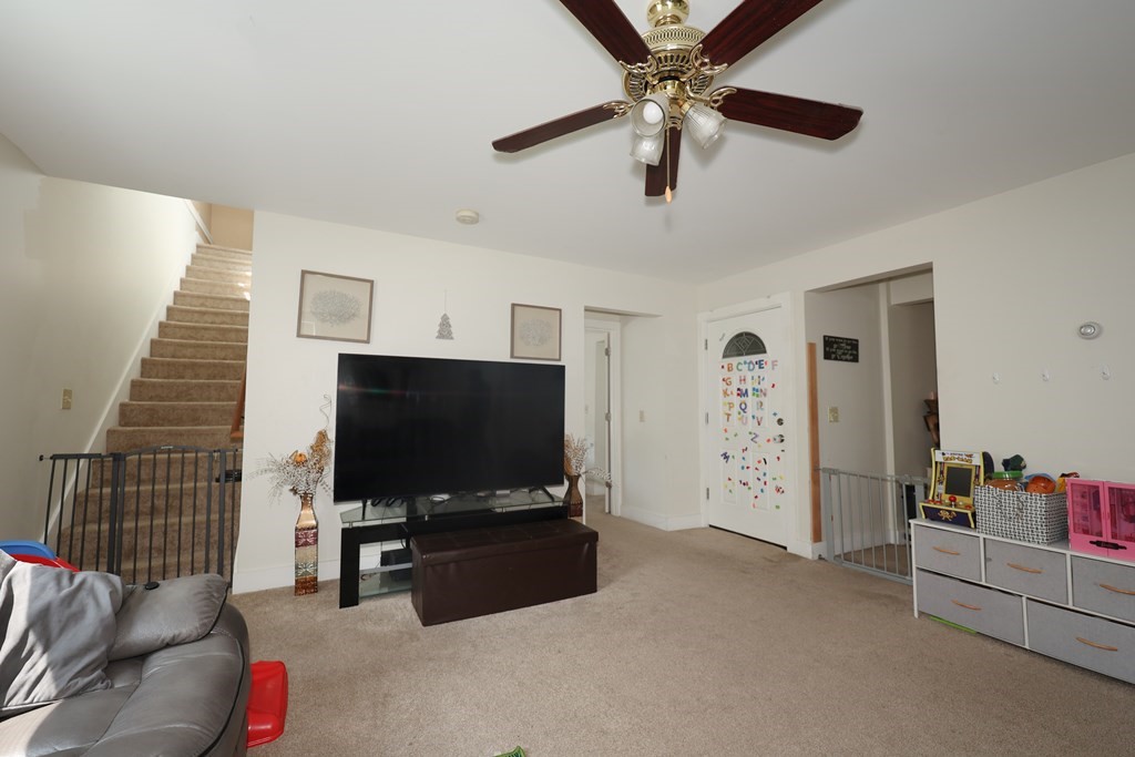 1450 Main Street Athol, MA 01331 - Photo 35 of 42 a living room with furniture and a flat screen tv