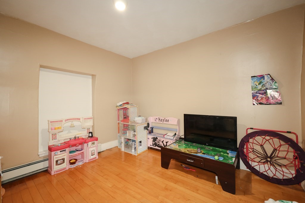 1450 Main Street Athol, MA 01331 - Photo 41 of 42 a living room with furniture and a flat screen tv