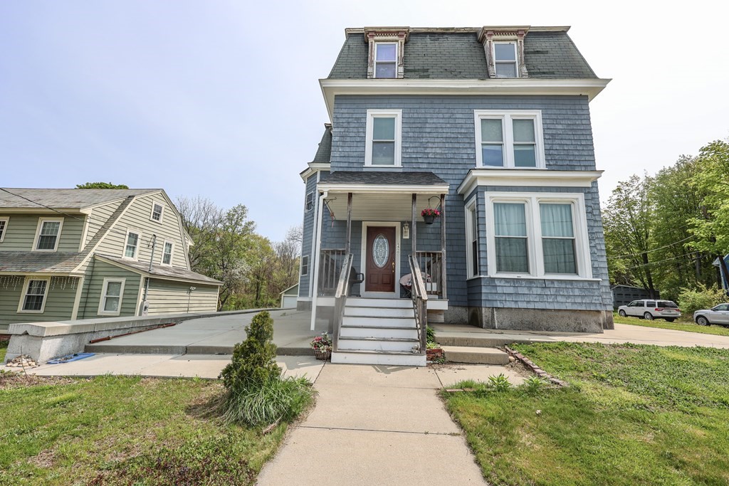 1450 Main Street Athol, MA 01331 - Photo 6 of 42 a house view with a garden space