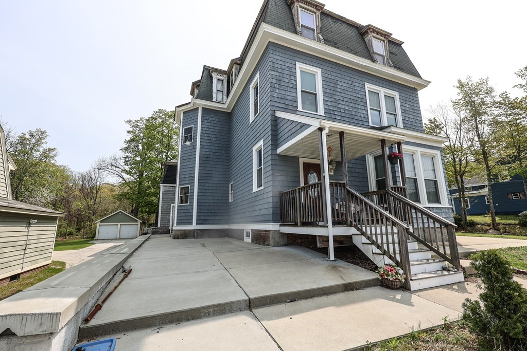 1450 Main Street Athol, MA 01331 - Photo 7 of 42 a front view of a house with a yard