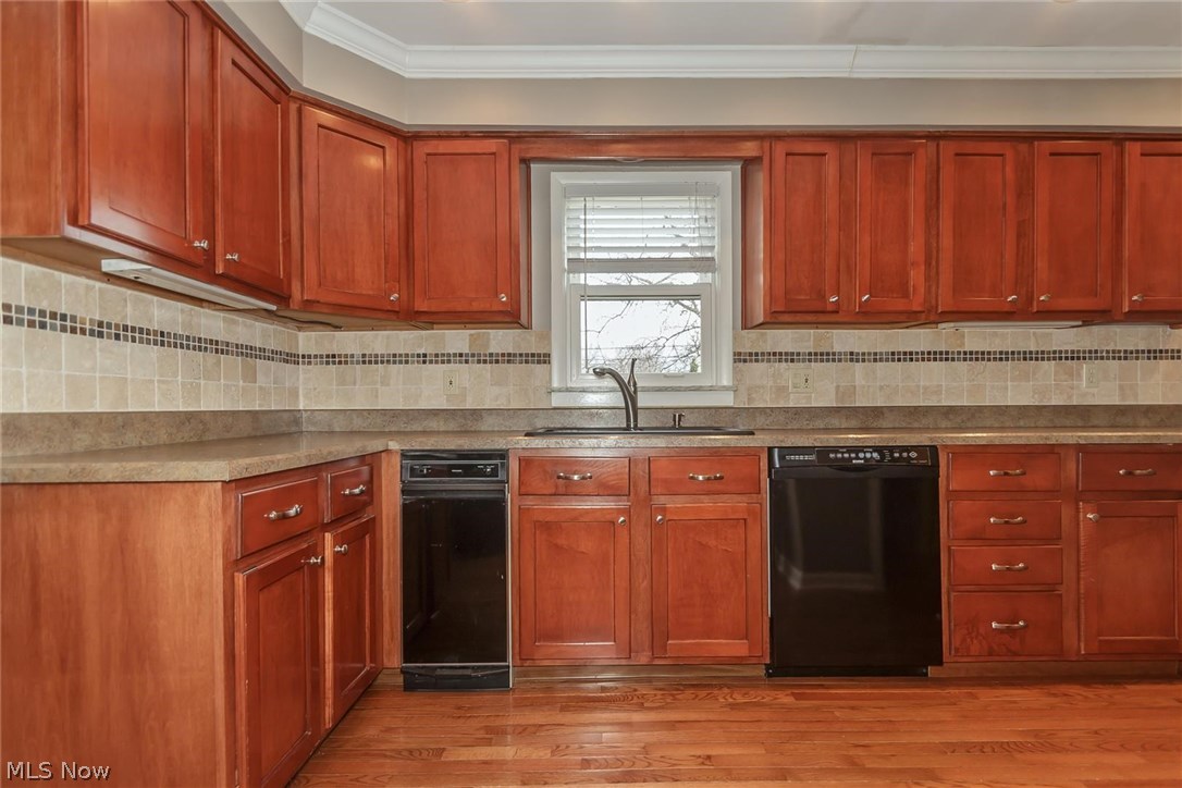 1143 Brainard Road Lyndhurst, OH 44124 - Photo 21 of 35 Plenty of counter space and cabinets also a trash compactor and dishwasher.