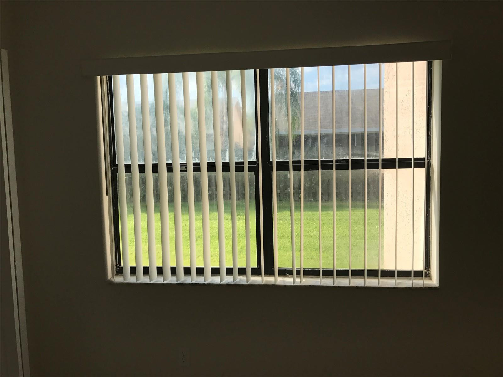 10053 Winding Lake Road, Unit 104 Sunrise, FL 33351 - Photo 19 of 44 a view of a room that has a large window