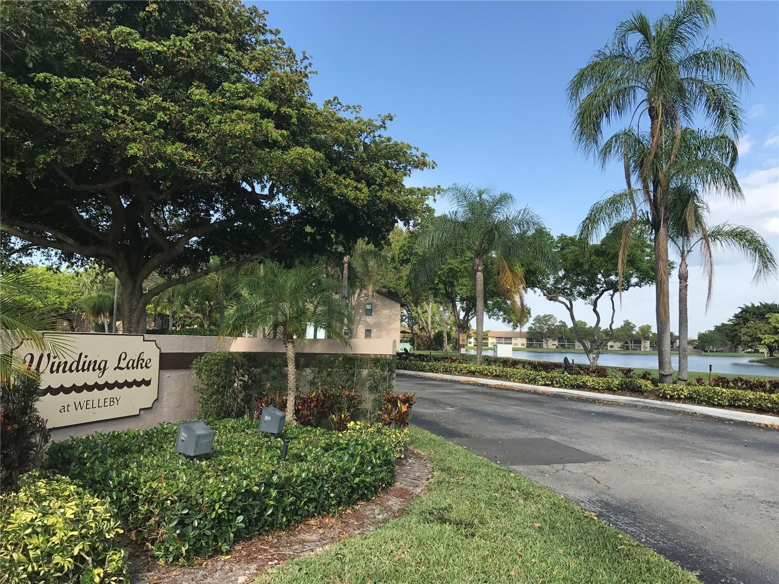 10053 Winding Lake Road, Unit 104 Sunrise, FL 33351 - Photo 32 of 44 a view of a park